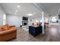 Open living room with fireplace and modern decor at 1368 New Hope Rd, Lawrenceville, GA 30045