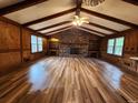 Large living room with hardwood floors and stone fireplace at 25 Bryans Dr, Mcdonough, GA 30252