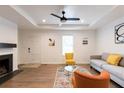 Living room featuring hardwood floors and a cozy fireplace at 3198 Oakdale Rd, Atlanta, GA 30354
