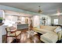 Open concept living room with hardwood floors and kitchen view at 1488 Beecher Sw St, Atlanta, GA 30310