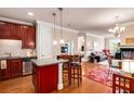 Open kitchen with granite counters, stainless steel appliances, and breakfast bar at 2300 Peachford Rd # 1209, Atlanta, GA 30338
