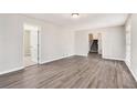 Open living area with hardwood floors and access to upper level at 3276 Marlanta Dr, Marietta, GA 30062
