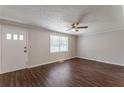 Spacious living area with wood-look floors and neutral wall colors at 6275 S Skyline Dr, Douglasville, GA 30135