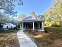 Gray craftsman style house with front walkway and landscaping at 278 Privette Sw Rd, Marietta, GA 30008