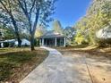 Gray craftsman style house with front walkway and driveway at 278 Privette Sw Rd, Marietta, GA 30008