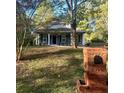 Gray craftsman style house with brick mailbox and landscaping at 278 Privette Sw Rd, Marietta, GA 30008