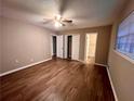 Spacious bedroom with wood-look floors and a large closet at 6354 Shannon Pkwy # 30C, Union City, GA 30291