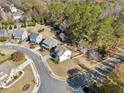 An aerial view showcasing the home's location within a residential neighborhood at 200 Haleys Ct, Woodstock, GA 30188