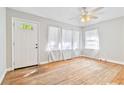 Bright living room with hardwood floors and neutral walls at 5147 Ellen St, Forest Park, GA 30297