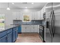 Modern kitchen with stainless steel appliances at 303 Boxwood St, Social Circle, GA 30025