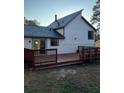 Deck with attached seating and a view of the backyard at 2688 Landington Way, Duluth, GA 30096