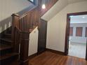 Elegant hardwood staircase with classic wooden railing at 1089 Avon Sw Ave, Atlanta, GA 30310