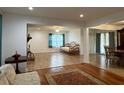 Open living space with hardwood and laminate floors at 2194 Klondike Sw Rd, Conyers, GA 30094