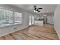Bright dining room with hardwood floors and access to deck at 1365 Renee Dr, Decatur, GA 30035
