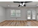 Bright dining room with hardwood floors and access to deck at 1365 Renee Dr, Decatur, GA 30035