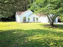 Charming white brick house with a spacious lawn at 4093 Chapel Mill Bnd, Decatur, GA 30034