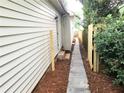 Sidewalk along the home providing backyard access at 2961 Hawk Se Ct, Marietta, GA 30067