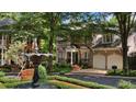 Beautiful community featuring a fountain and manicured landscaping at 1144 Bellewood Sq, Dunwoody, GA 30338