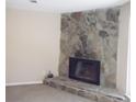 Stone fireplace in living room at 8060 Northcrest Dr, Jonesboro, GA 30238