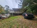 Exterior view of a raised ranch house at 3230 Peachtree St, Lithia Springs, GA 30122