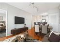 Virtually staged living room, dining area and kitchen at 821 Ralph Mcgill Ne Blvd # 3404, Atlanta, GA 30306