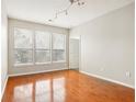 Living room with hardwood floors and large windows at 821 Ralph Mcgill Ne Blvd # 3404, Atlanta, GA 30306