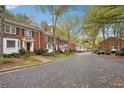 Street view of similar brick townhouses at 5417 Trentham Dr, Dunwoody, GA 30338