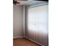 Simple dining room with hardwood floors and window blinds at 1604 Pine Tree Trl, Atlanta, GA 30349