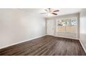 Bright living room featuring hardwood floors and a ceiling fan at 2604 Harmony Way, Atlanta, GA 30344