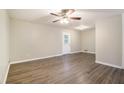 Living room with vinyl plank flooring and ceiling fan at 2910 Delowe Dr, Atlanta, GA 30344