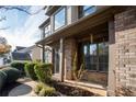 Front entrance with brick columns and landscaping at 816 Buffington Way, Canton, GA 30115