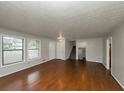 Hardwood floor living room with an open floor plan at 4027 Evelyn Dr, Powder Springs, GA 30127