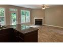 Spacious Gathering room featuring a fireplace and lots of natural light at 2814 Dominion Nw Ln, Kennesaw, GA 30144