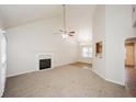 Spacious living room with vaulted ceiling, fireplace and carpet at 4112 Meadowlark Ct, Powder Springs, GA 30127