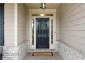 Elegant front door entryway with a welcoming wreath at 90 Hickory Pointe Dr, Acworth, GA 30101