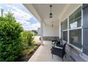 Inviting front porch with stone accents and comfortable seating area at 197 Stafford Ln, Villa Rica, GA 30180