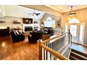 Spacious living room with hardwood floors and fireplace at 2515 Little John Ct, Cumming, GA 30040