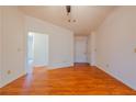 Living room with hardwood floors and high ceilings at 1121 Whisper Wind Dr, Mcdonough, GA 30253