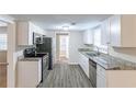 Modern kitchen with granite counters and stainless steel appliances at 3575 Bright Star Rd, Douglasville, GA 30135