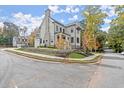 Two-story house with gray siding and brick accents, street view at 3794 Wynn Walk, Brookhaven, GA 30341
