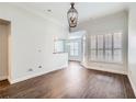 Bright dining room with hardwood floors and chandelier at 3777 Peachtree Ne Rd # 1435, Brookhaven, GA 30319