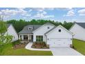 Two-story craftsman style home with a two-car garage at 3719 Tielman St, Snellville, GA 30078