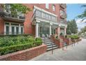 Brick building exterior with landscaped gardens and inviting entrance at 206 11Th Ne St # 703, Atlanta, GA 30309