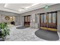 Elegant building lobby with marble floors and ornate doors at 2870 Pharr Court South # 503, Atlanta, GA 30305