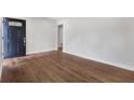 Spacious living room featuring hardwood floors and fresh paint at 2297 Sheryl Dr, Decatur, GA 30032