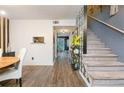 Entryway with stairs and view into dining area at 3103 Reeves Se St, Smyrna, GA 30080