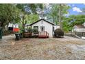 Backyard view of house with deck and ramp access at 4118 Clairmont Rd, Chamblee, GA 30341