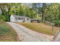 Charming ranch home situated on a hilltop with a long driveway at 3018 Wanda Sw Cir, Atlanta, GA 30315