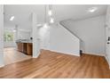 Bright dining room with hardwood floors and view of kitchen at 2357 Bayrose Cir # 57B, East Point, GA 30344