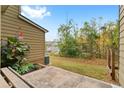 Private patio with access to backyard and green space at 2357 Bayrose Cir # 57B, East Point, GA 30344